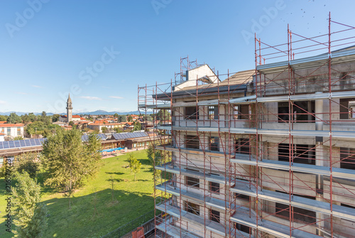 Residential Building Under Construction with Scaffolding