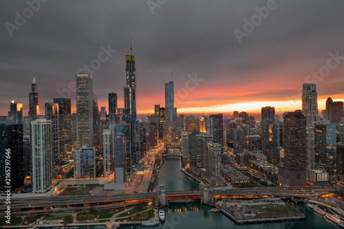 Downtown Chicago and River Beneath Stormy Sunset