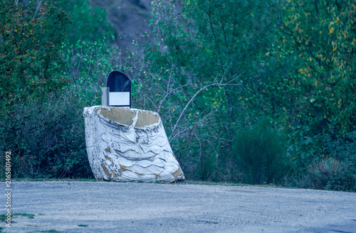 Canvastavla Old mattress discarded by road in forest showing waste and degradation