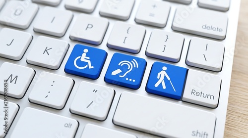 Computer keyboard featuring blue keys with white accessibility symbols for wheelchair, hearing impairment, and visual impairment assistance.