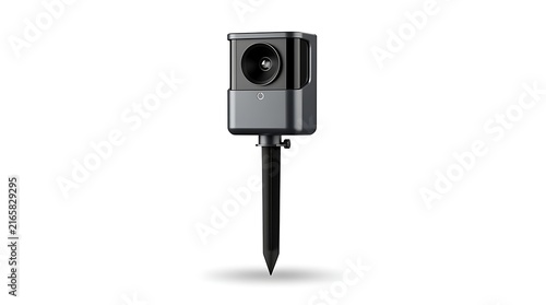 A modern black outdoor security camera mounted on a ground spike against a white.