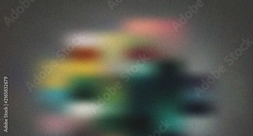 Obraz na plátně Soft muted gray abstract with blurred colorful elements in yellow, green, red, a