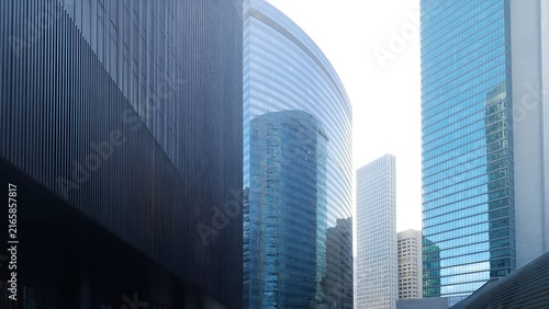 Real Estate. Financial Center. High office buildings in the business center of the city. Glass and steel. Skyscrapers as a background. 