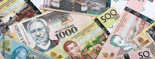 Foto Haitian gourde money banknotes pile on table