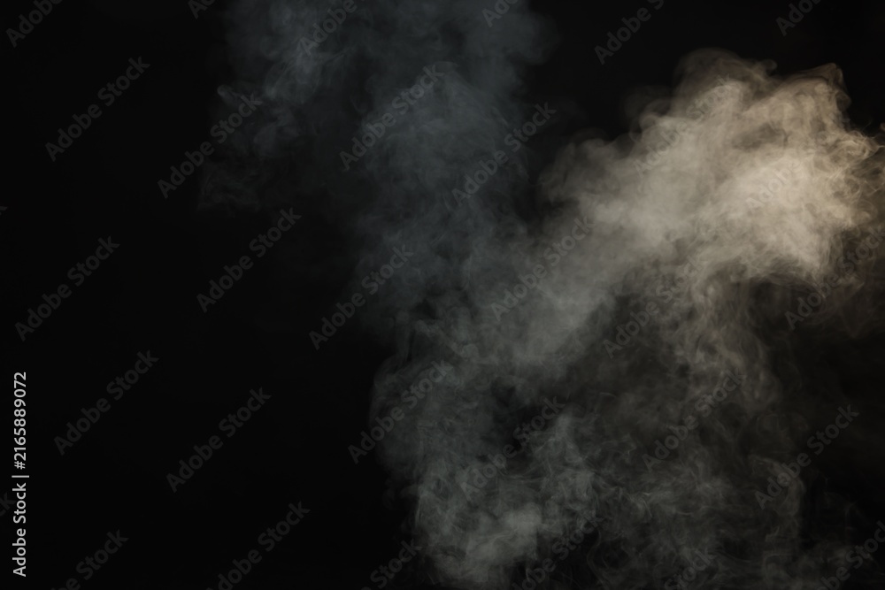 Fototapeta premium Beautiful smoke in light on dark background