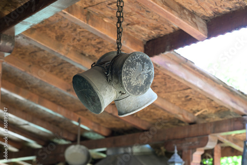 Hanging Traditional Metal Pails Under Roof