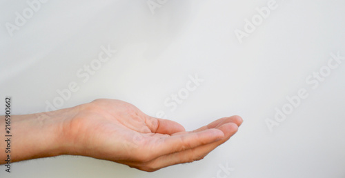 Russian coins on an open palm on a white background. there are coins in the hand. the balance of finances after paying for the purchase of goods or other payments. inflation and price increases