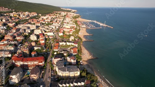 Marina port in Sveti Vlas. Panoramic aerial view of houses and hotels, sea and beaches of Sveti Vlas in Bulgaria from above, top view from drone. Summer holiday in Europe. 
