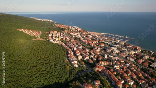 Panoramic aerial view of houses and hotels, near mountains, sea and beaches of Sveti Vlas in Bulgaria from above, top view from drone. Summer holiday in Europe. 
