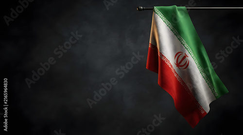 Iranian national flag on dark textured background