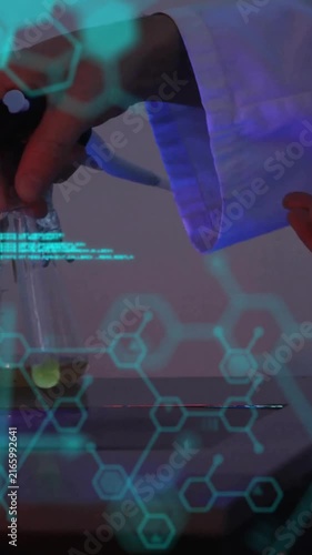 Animation of data processing with chemical formula over caucasian male scientist working in lab