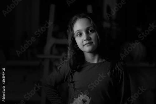 Bild auf Leinwand Portrait of a Young Girl in Black and White