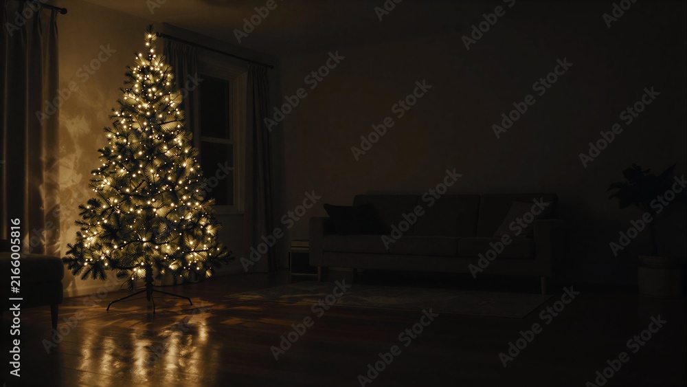 Fototapeta premium Cozy living room with glowing Christmas tree, warm lights reflecting on hardwood floors.