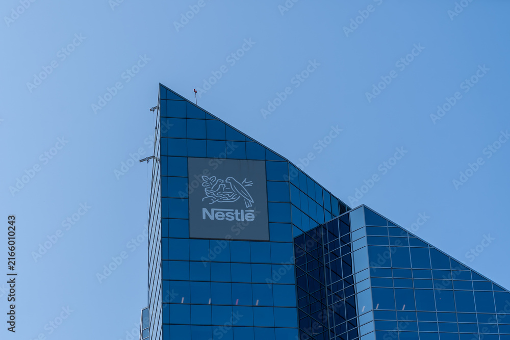 Fototapeta premium Toronto, ON, Canada - August 21, 2026: Nestle Canada Building on Sheppard Avenue West in North York, Toronto, Canada. Nestle S A is the world's largest publicly held food and drink processing conglom