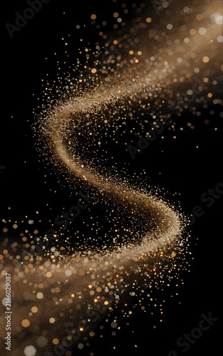Sinuous wave of glowing golden glitter dust particles flowing across a dark background