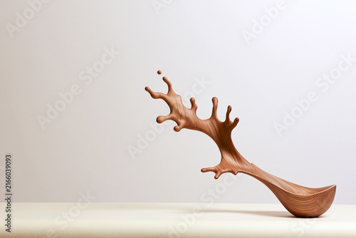 Frozen water splash carved from wood surreal sculpture concept