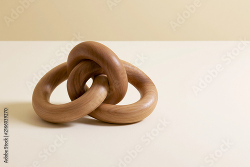 Three interlocking wooden rings carved from one piece impossible craft