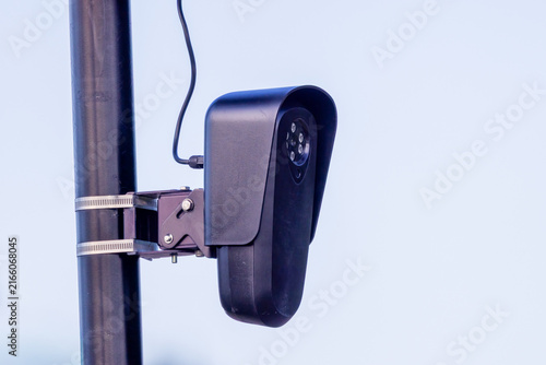 Close-up automated license plate reader camera mounted on pole