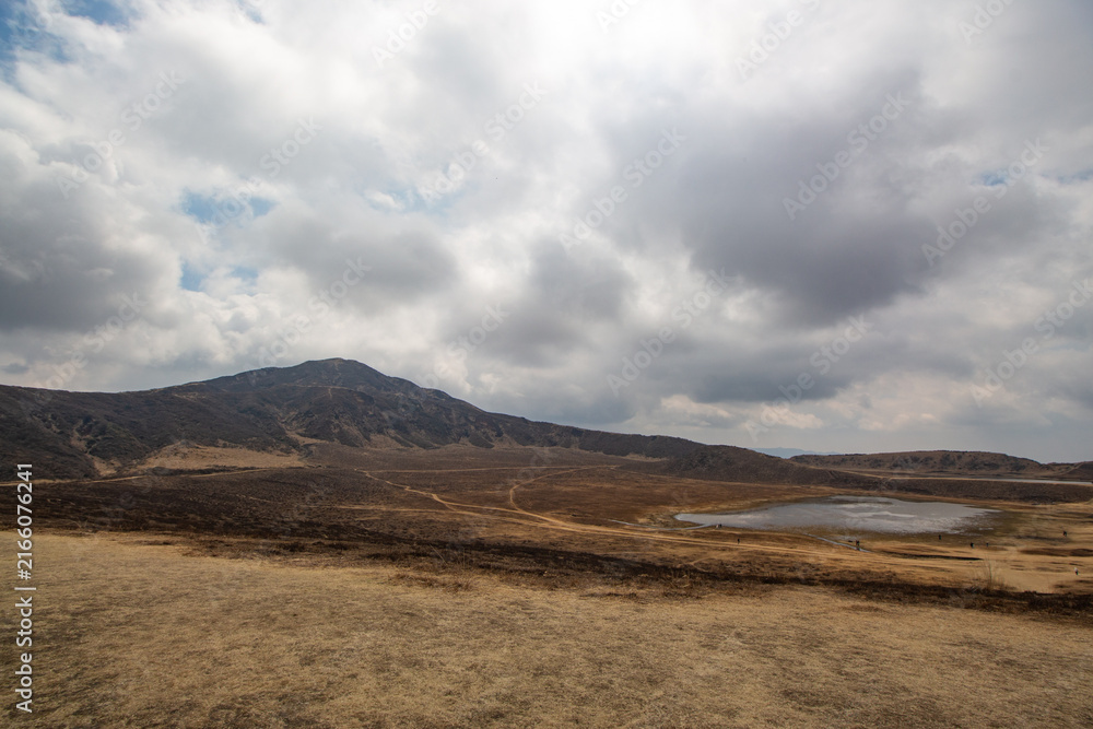 Obraz premium Mysterious Spring landscape of Kusasenrigahama or Aso Kusasenri Grassland at Aso-Kuju National Park. Aso, Kumamoto, Japan