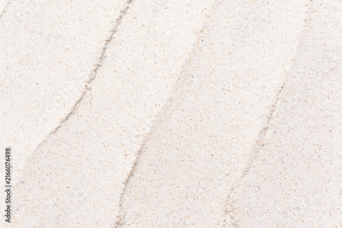 Close-up texture of organic rye flour, grey grain powder background, top view