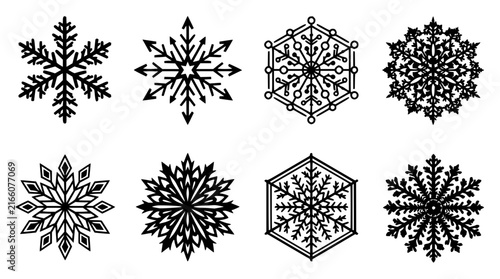 Black snowflakes set with intricate geometric designs featuring winter, frost, and ice patterns with abstract and symmetrical shapes and dark contrast