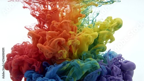 Vibrant rainbow ink swirling in water abstract background, for creative color drop
