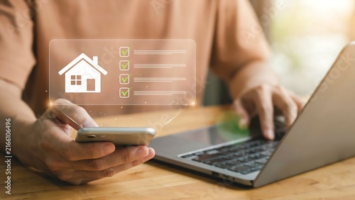 Person Using Digital Smartphone Interface to Manage Real Estate Property Inspection Checklist Online at Home