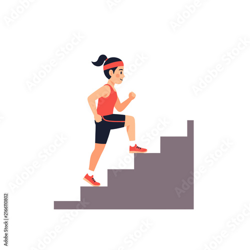 Woman running up stairs for cardio fitness training.