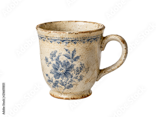 Vintage ceramic mug with floral design isolated on white background