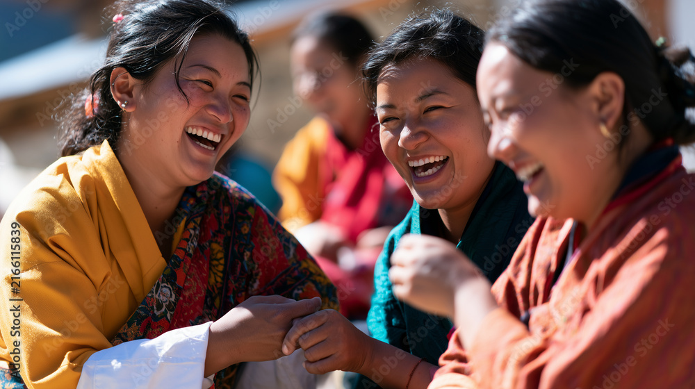 Obraz premium Joyful Bhutanese Women Sharing Laughter Together During The Annual Laya Highland Festival