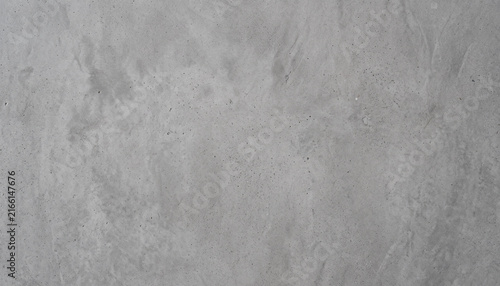 Obraz na plátně A close-up of a textured gray concrete surface, showcasing subtle variations in tone and minor imperfections, ideal for background or architectural design