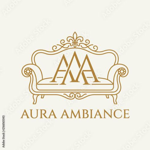 Elegant furniture logo with sofa and monogram text.