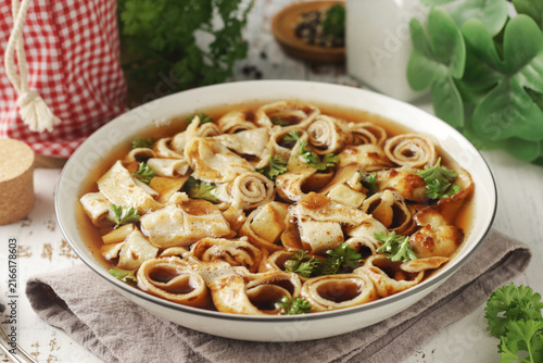 A bowl with a traditional Austrian soup Frittatensuppe