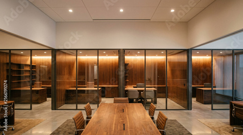 Modern office interior with private work pods, warm wood tones and natural light, modern office design, workspace, business