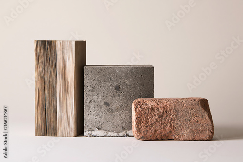 Reclaimed timber concrete and brick material samples with copy space