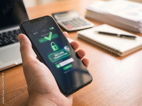 Secure Mobile Banking Transaction on Smartphone with Padlock Icon and Checkmark for Online Financial Payment Safety and Cyber Security Concept