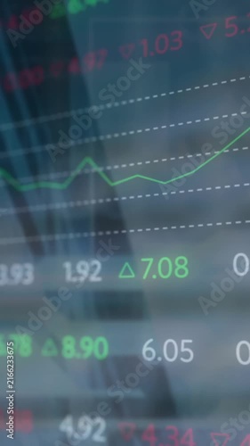 Animation of stock market data processing against low angle view of tall building
