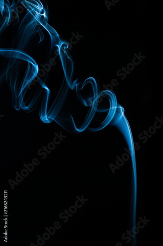 Принти на полотні Studio shot of smoke swirl isolated on black background