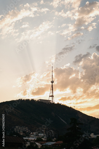 Canvastavla View of Mtatsminda and TV tower against sunset in Tbilisi city landscape