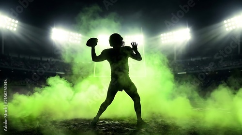 Silhouette of football player throwing ball in green smoke.
