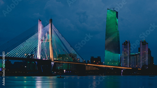 Illuminated Bridge and Hankou Skyline at Night in Wuhan