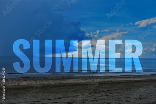 A serene sandy beach meets calm ocean waves under a vibrant blue cloudy sky with large transparent typography overlay.
