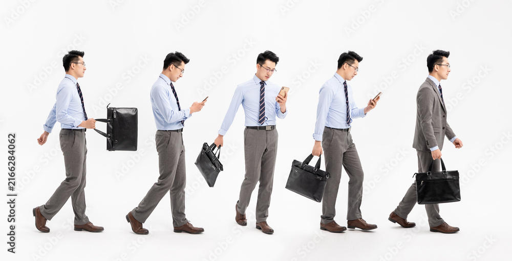 Obraz premium Businessman walking with smartphone and briefcase in multiple poses