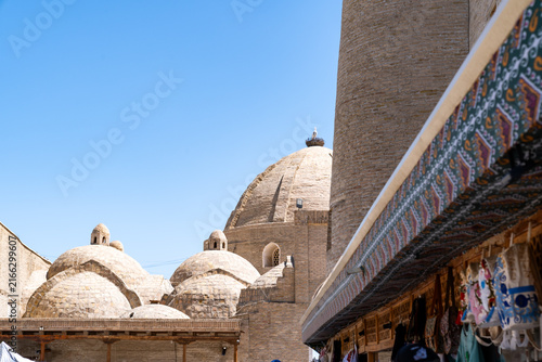 some particular roofs and stalls among the streets of Bukhara during a day in August