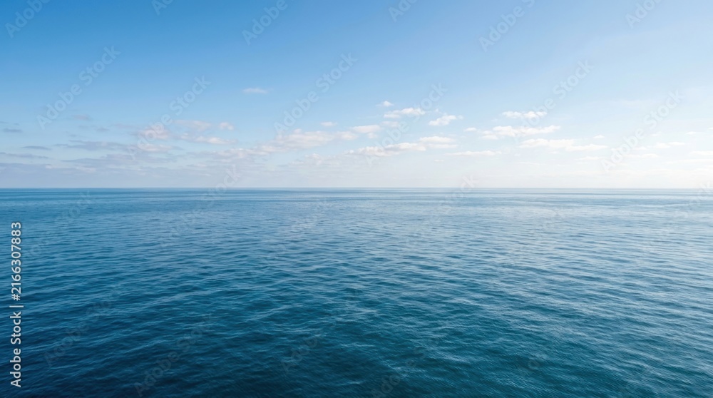 Fototapeta premium vast open blue sea surface stretching calm towards the horizon