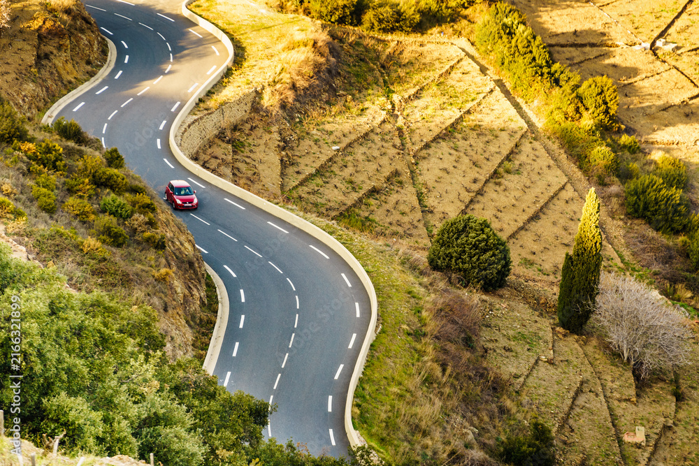 Fototapeta premium Winding asphalt road in France