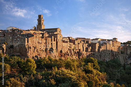 Pitigliano, Grosseto, Tuscany, Italy. Dawn view of the picturesque medieval hill town and historic center, founded by the Etruscans and built on a tuff cliff.