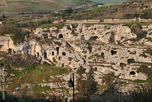 Gravina in Puglia, Bari, Italy. View of the Seven Chambers, a cave settlement dug in the early Middle Ages into the wall of the canyon.