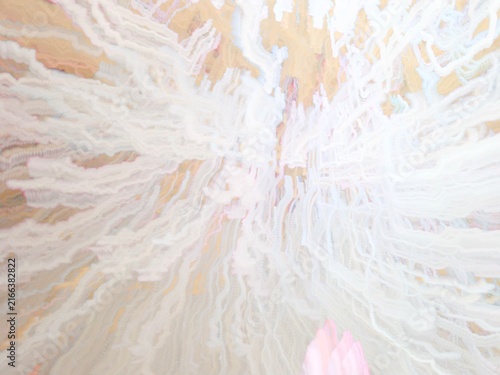 Abstract long exposure zoom burst with radiating wavy white and pale pink lines on light background