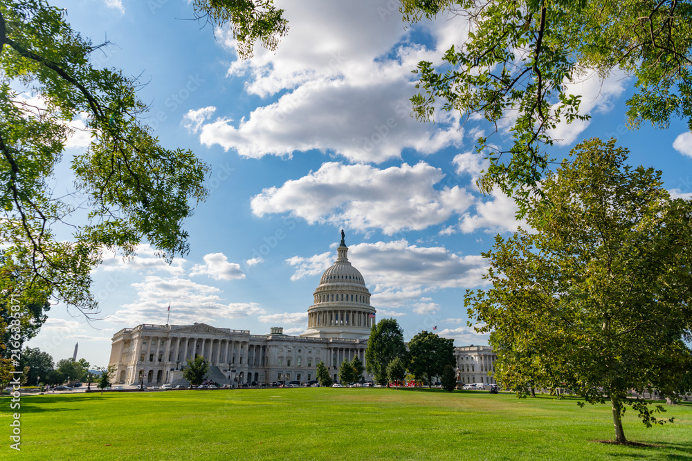 Obraz premium The Capitol building in Washington. Architecture view on dome with column. Famous Capitol in Washington DC. Washington DC landmark. Senate and House in Washington DC. Capitol dome